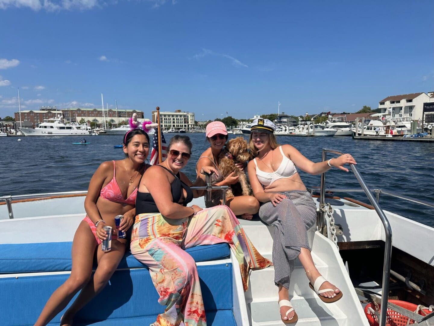 A group of people on a boat in the water.