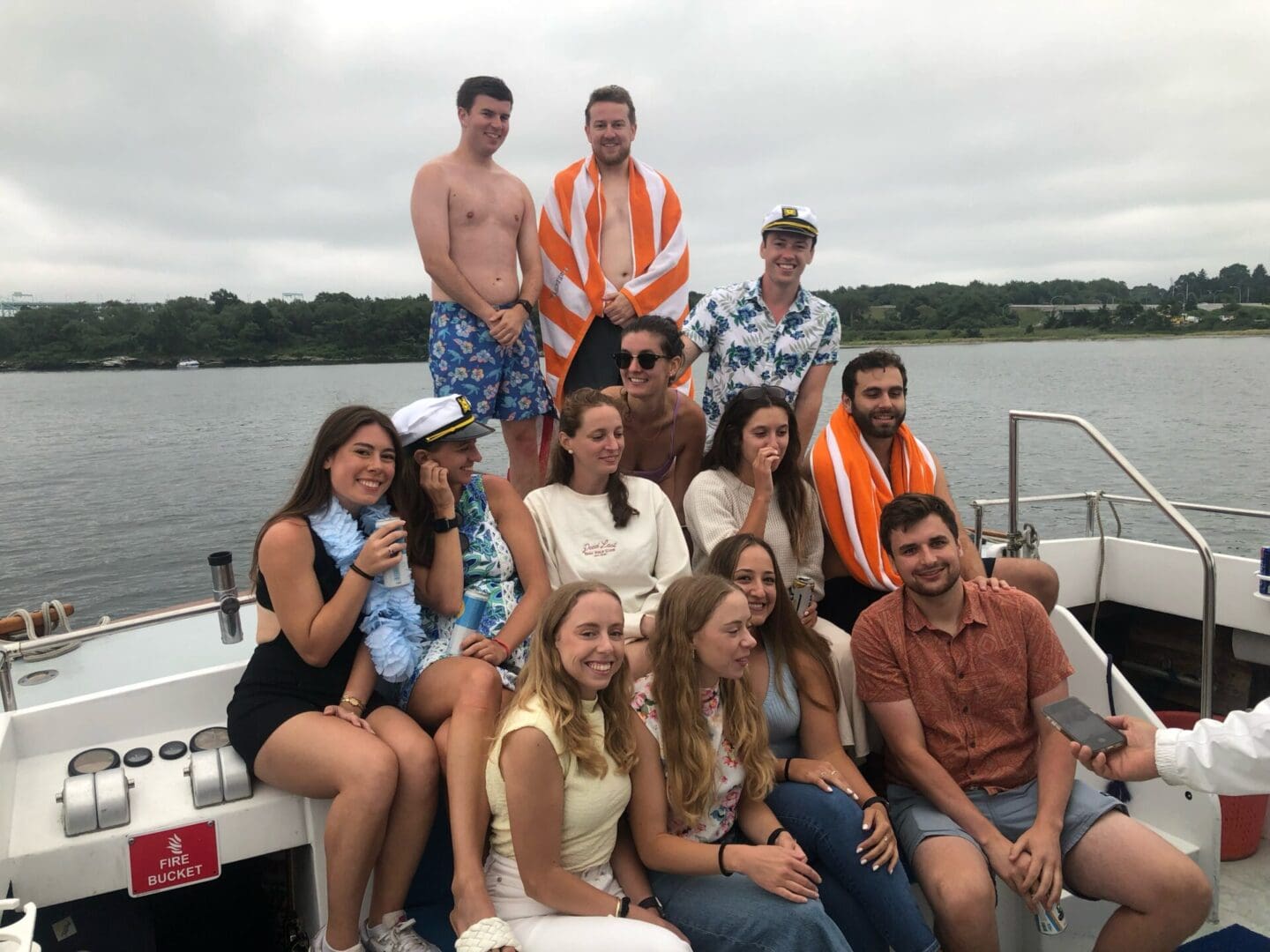 A group of people on the back of a boat.